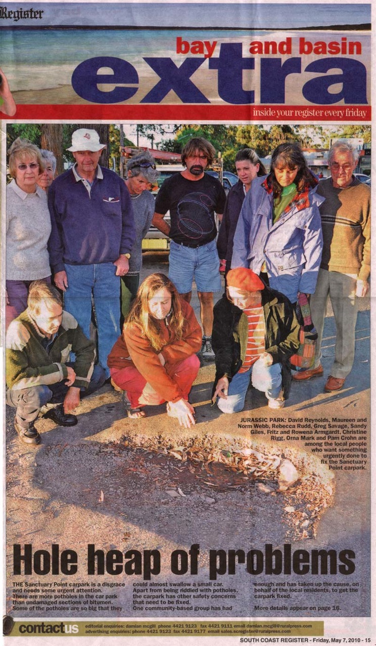 crowd-around-hole